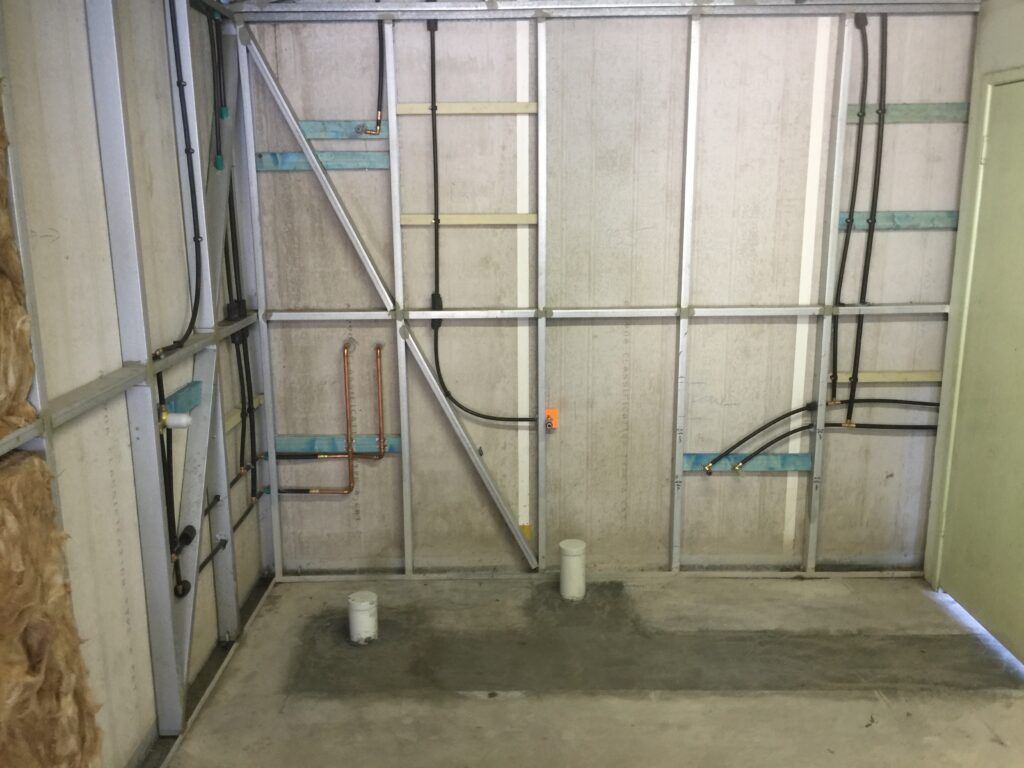 Plumbing rough-in work during new-home construction