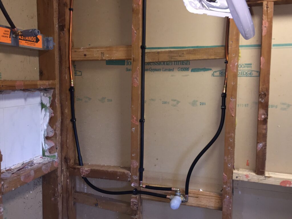 Plumbing rough-in work during a home renovation